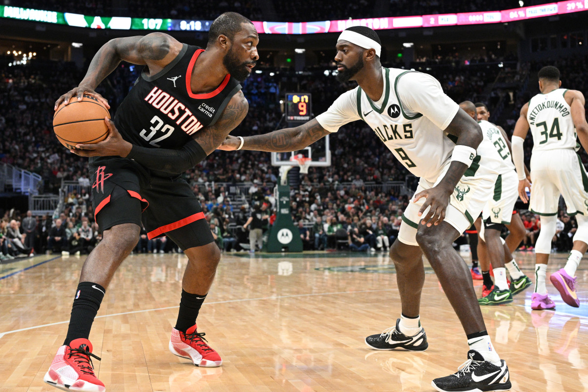 Dec 17, 2023; Milwaukee, Wisconsin, USA; Houston Rockets forward Jeff Green (32) drives against Milwaukee Bucks forward Bobby Portis (9) in the second half at Fiserv Forum.